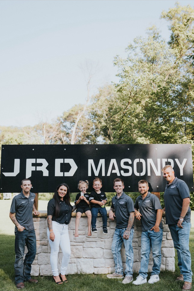 JRD Masonry team posing outdoors